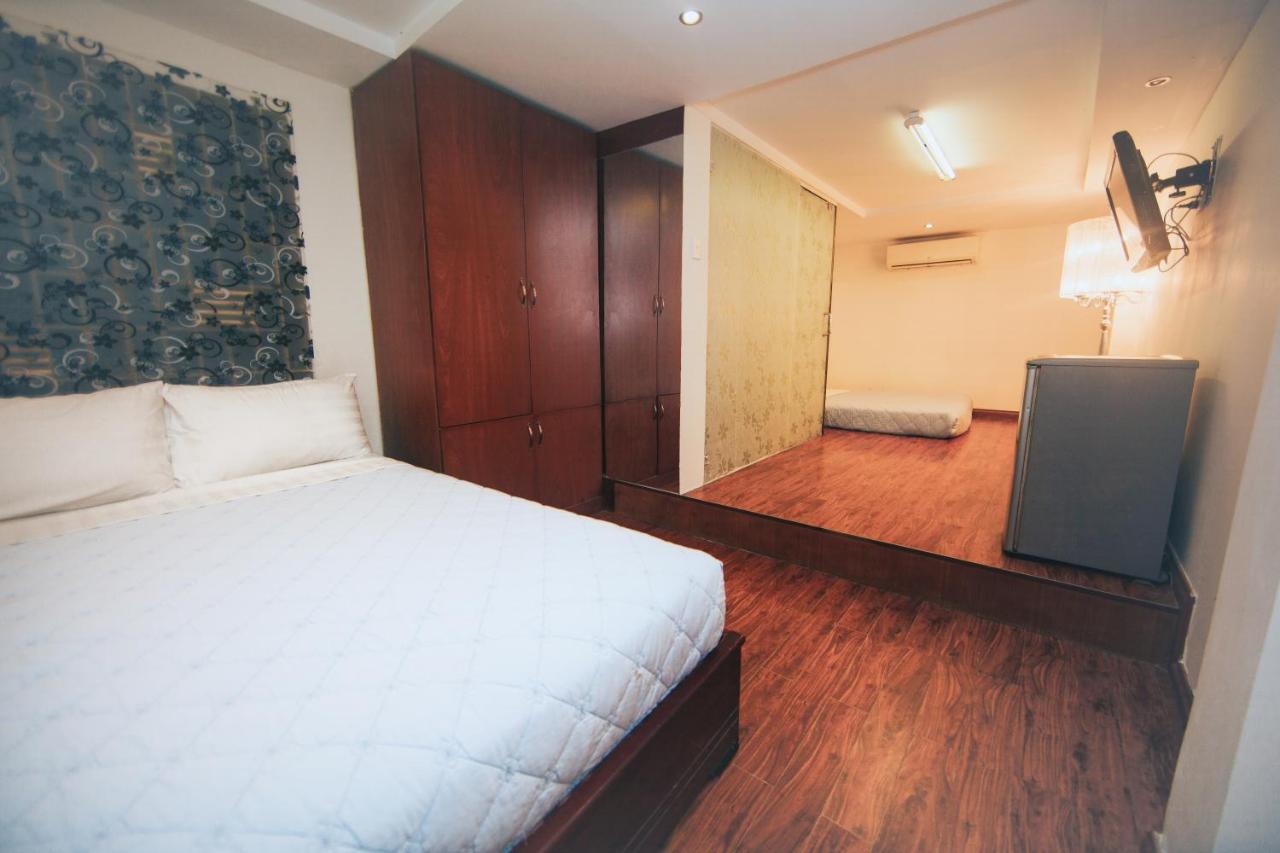 Ha Vy Hotel Thành Pho Ho Chí Minh Esterno foto